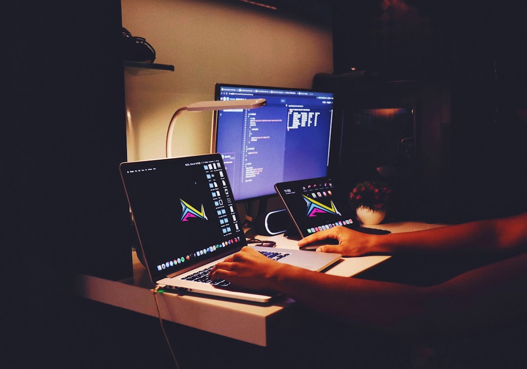 How to Use PowerShell to Comment, Organize, and Debug Scripts 2 woman in black tank top sitting in front of computer script organization clean code developer workspace 1
