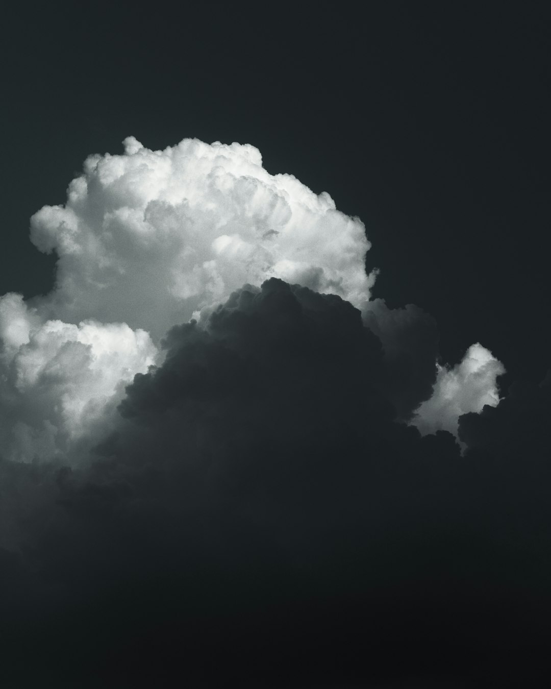 a black and white photo of a cloud in the sky cloud saves ps plus ps5 settings game saves