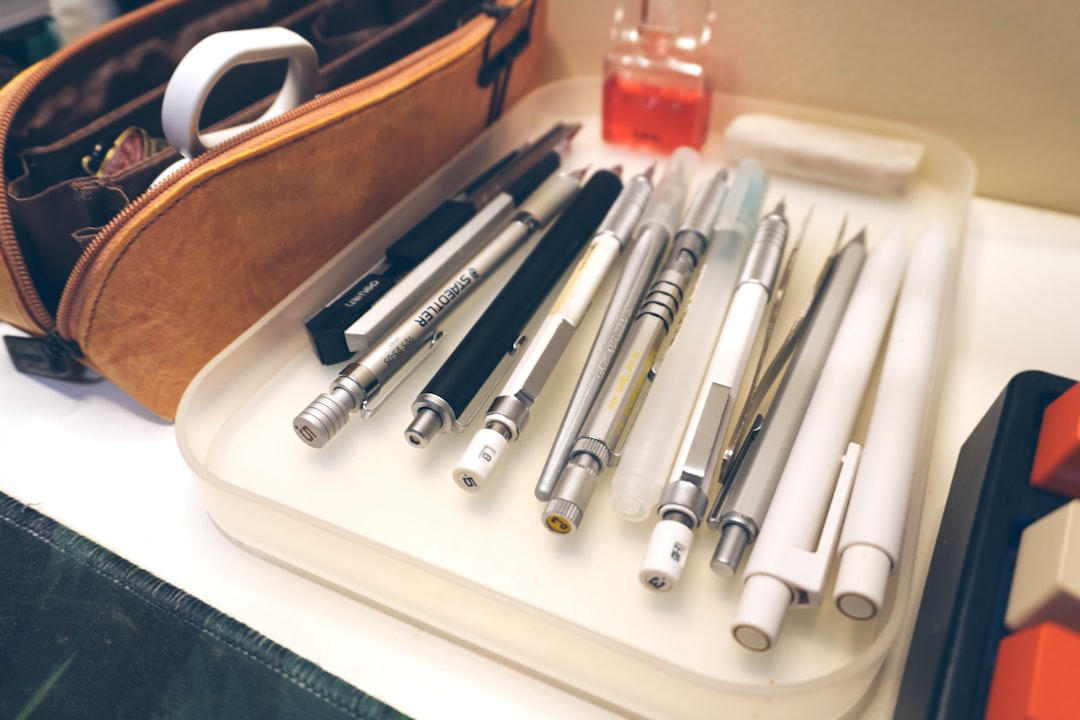 a bunch of pens are sitting on a tray dab rig concentrate vape pen wax tool kit