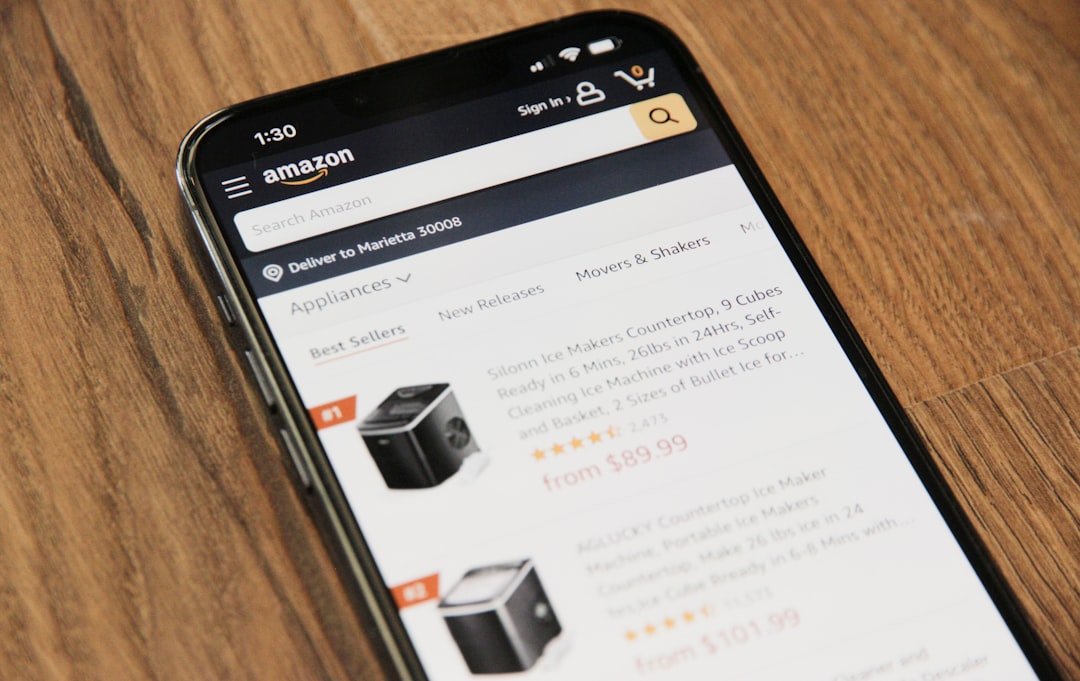a cell phone sitting on top of a wooden table privacy settings amazon wishlist secure browsing
