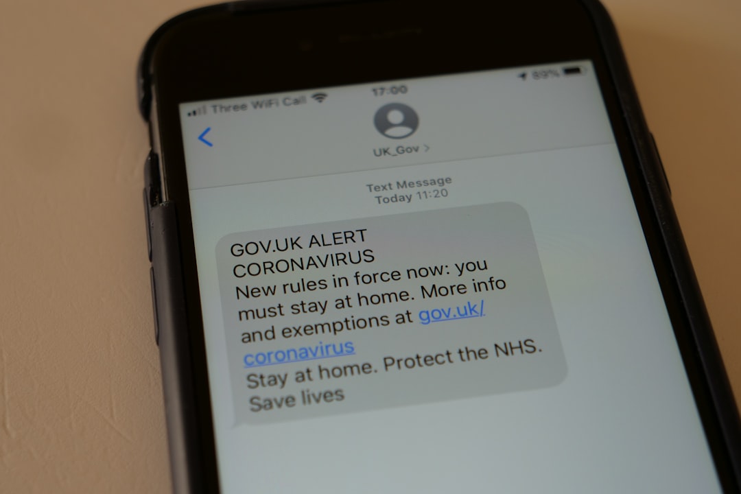 Where to Find Official WhatsApp Help and Contact Customer Support 2 a cell phone with a text message on the screen scam alert fake tech support smartphone security