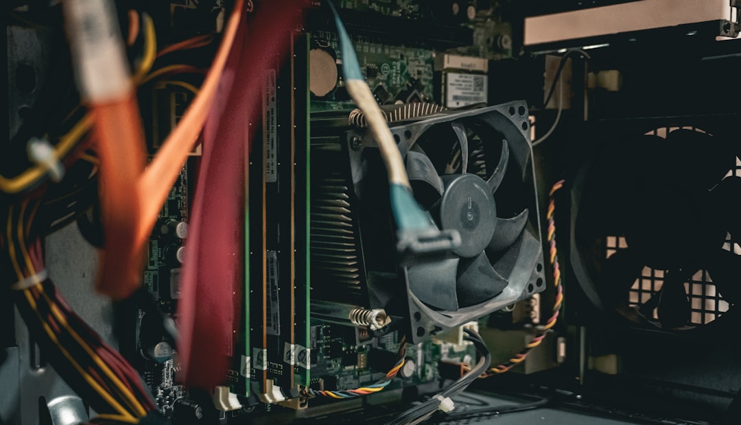 How to Diagnose Failing Hardware on Your Computer: Common Signs and Easy Troubleshooting Tips 3 a close up of a computer with a fan and wires dusty computer pc inside cleaning pc 1