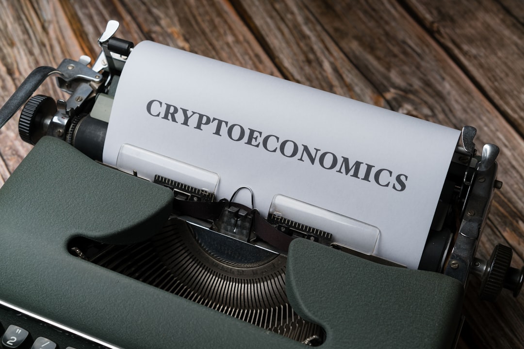 a close up of a typewriter with a paper on it compliance document policy development cryptocurrency regulations
