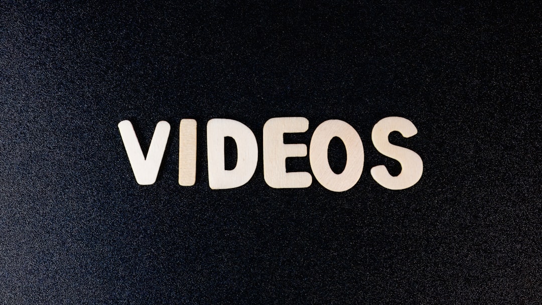 How to Use AI Video Creation Platforms to Produce Social Media Ads That Convert Over 5% 2 a close up of the word videos on a black background ai video platform voiceover creation subtitles