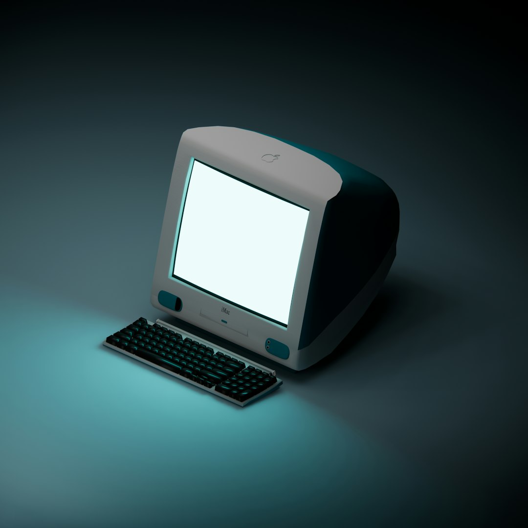a computer with a white screen sitting on a table developer computer kafka interface mac desktop