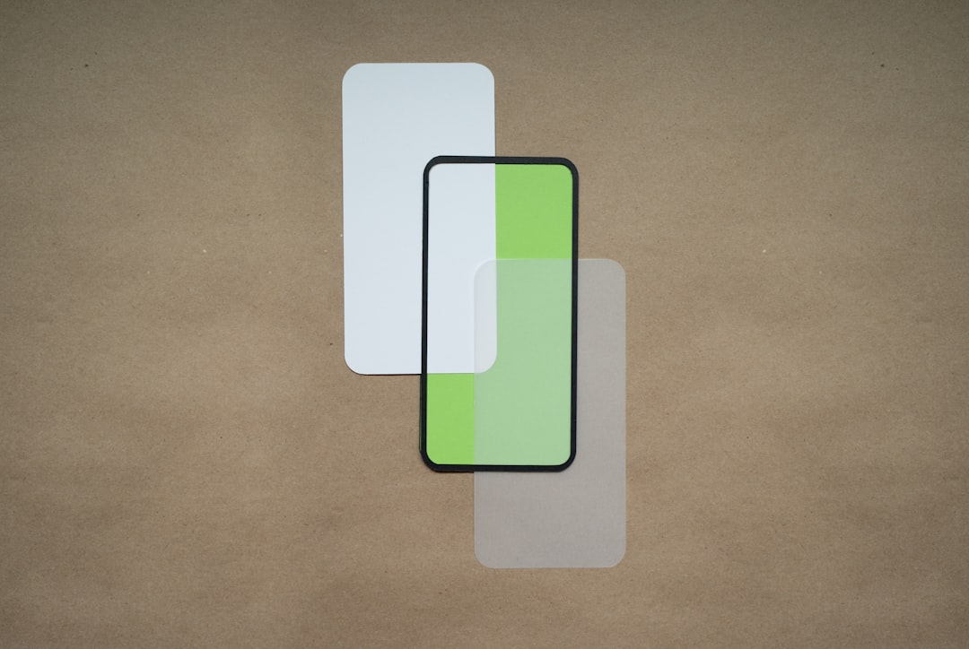 a couple of pieces of glass sitting on top of a table clipboard manager app android copy paste