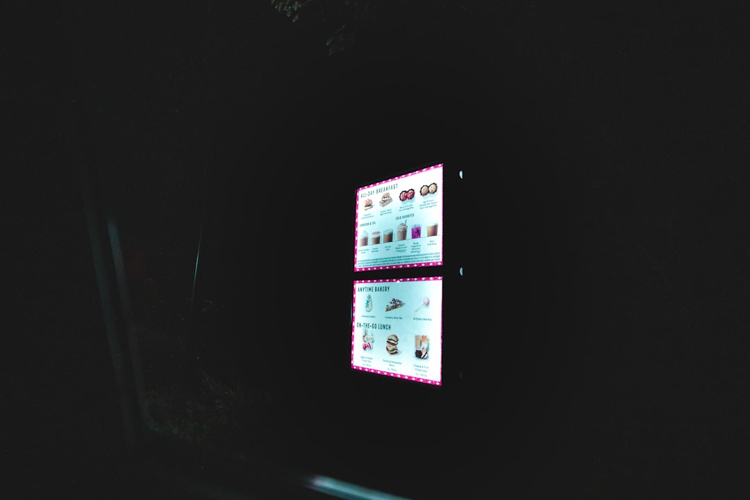 a dark room with two screens on the wall kde plasma add widgets media controller how to add applet