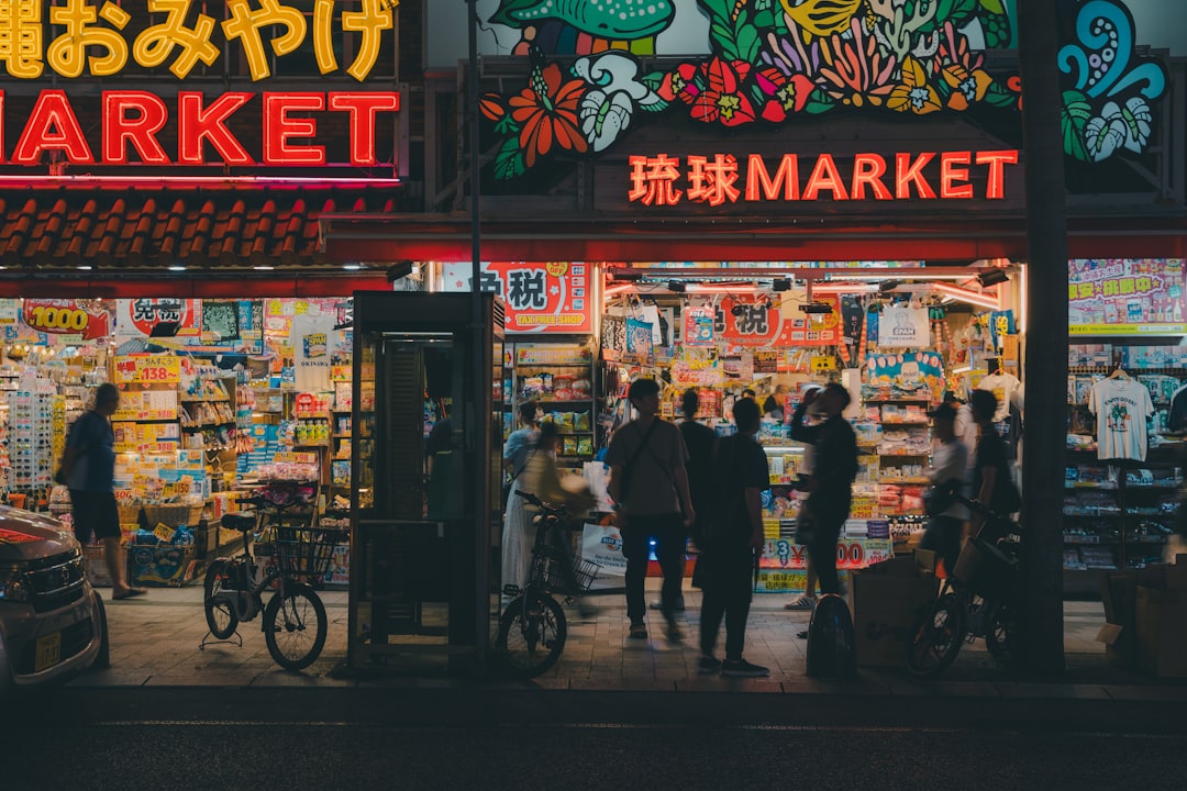 a group of people standing outside of a market market research consumer behavior data analysis