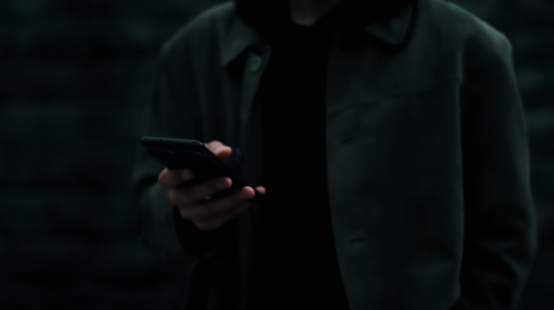 What to Do If You’ve Been Removed as a Follower on Instagram: Advice for American Social Media Users 2 a man holding a cell phone in his hand scam alert fake tech support smartphone security