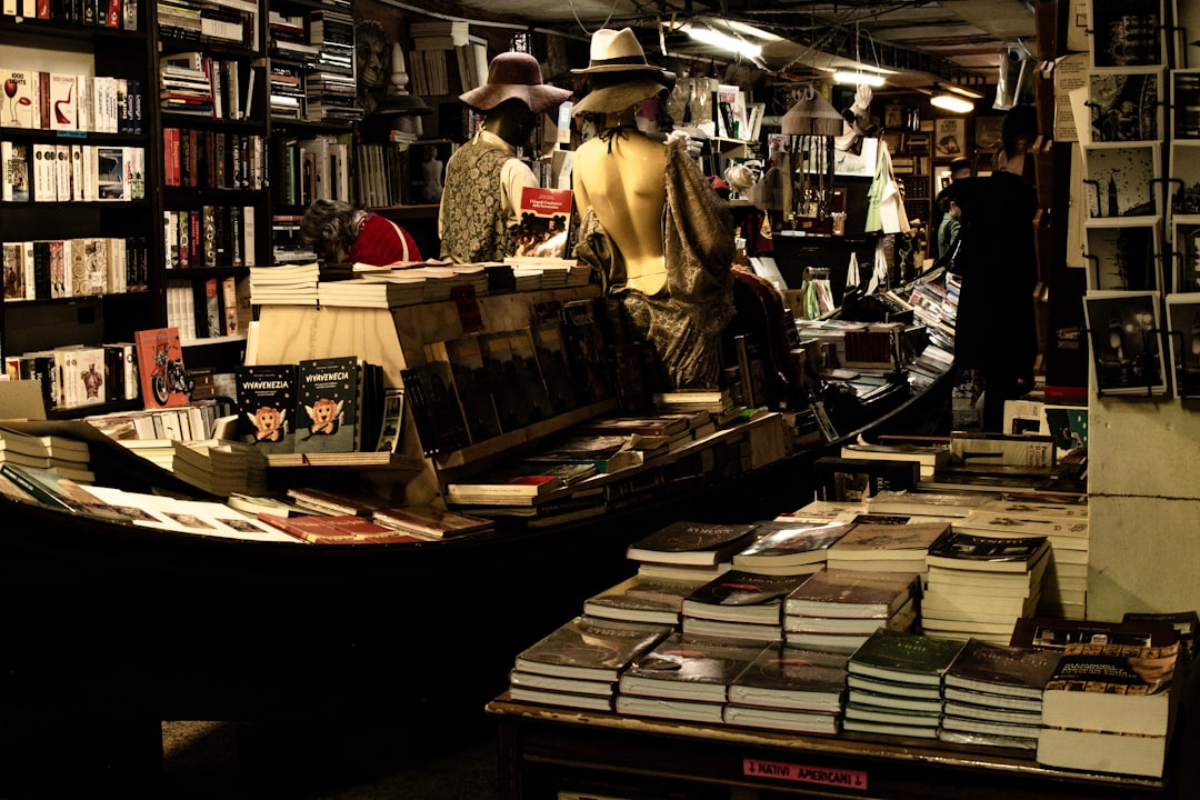 Success Stories: Online Stores Thriving with HostMonster eCommerce Hosting 2 a room filled with lots of books and a boat online bookstore rare books ecommerce reading
