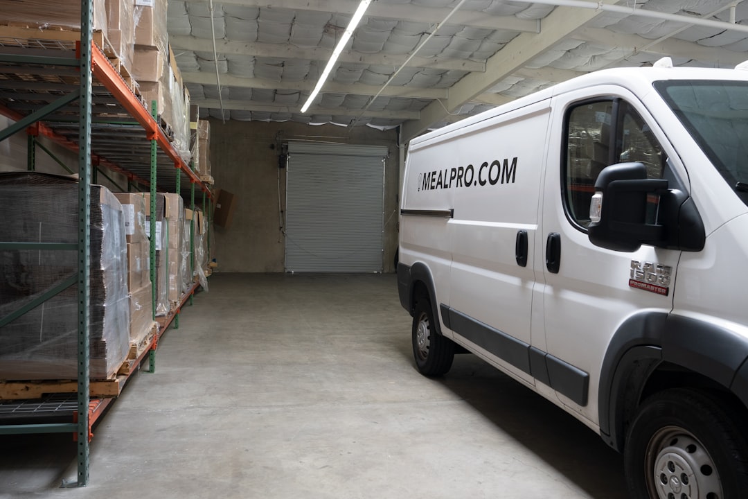 a white van parked inside of a warehouse local supplier warehouse delivery regional dropshipping