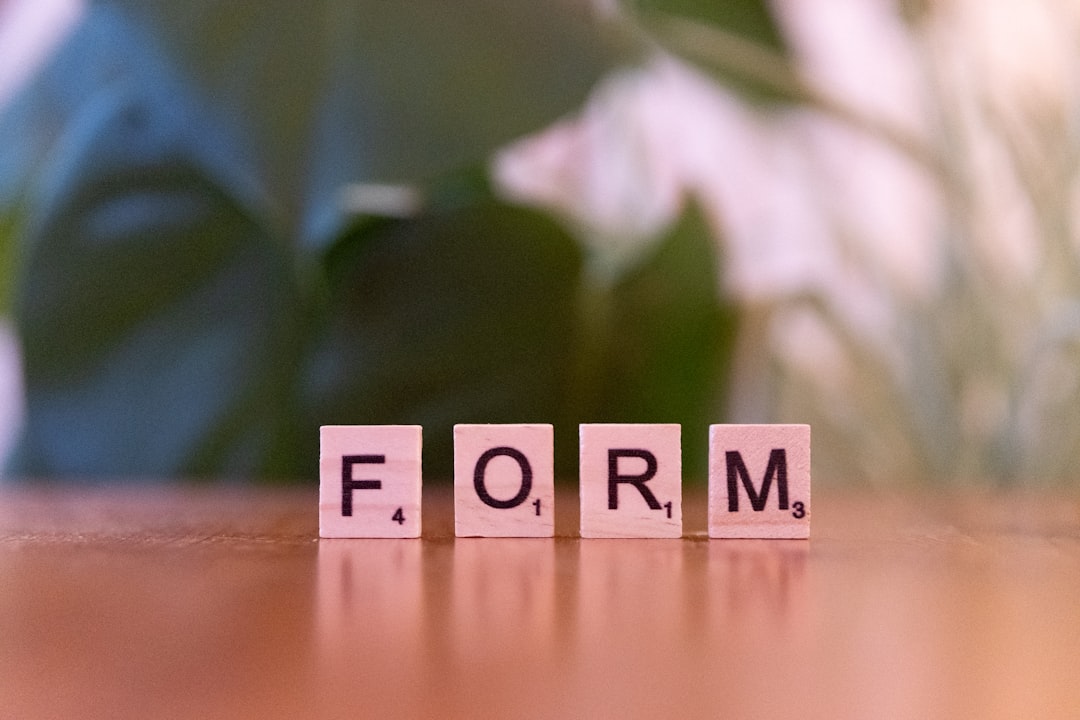 scrabble letters spelling form on a wooden table forum widgets design posts integration