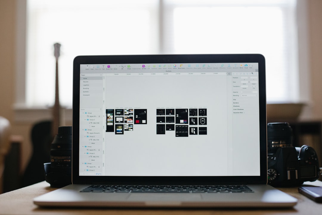 turned on laptop computer canva thumbnail graphic design software interface