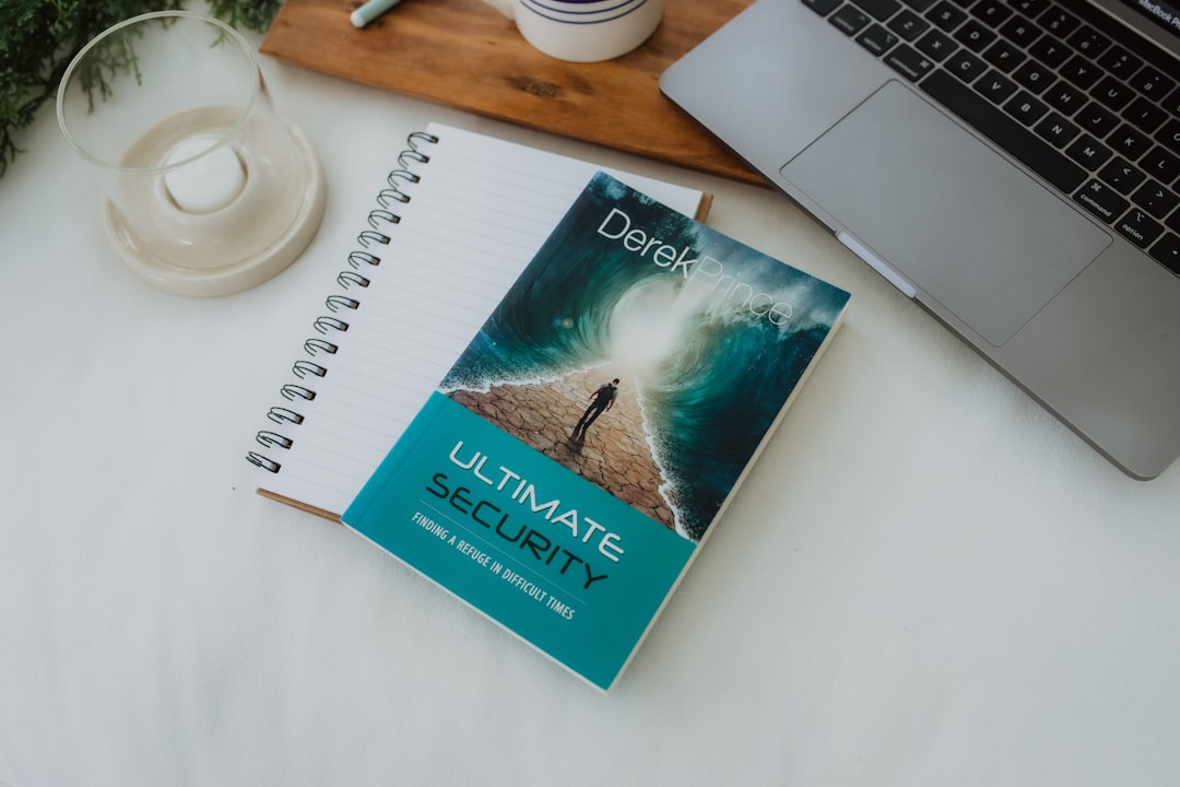 a book sitting on top of a table next to a laptop lifestyle blogger social media strategy content planning 1