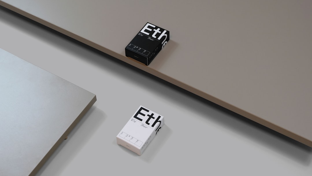 a couple of black and white stamps sitting on top of a table ereader comparison epub vs azw3 file formats