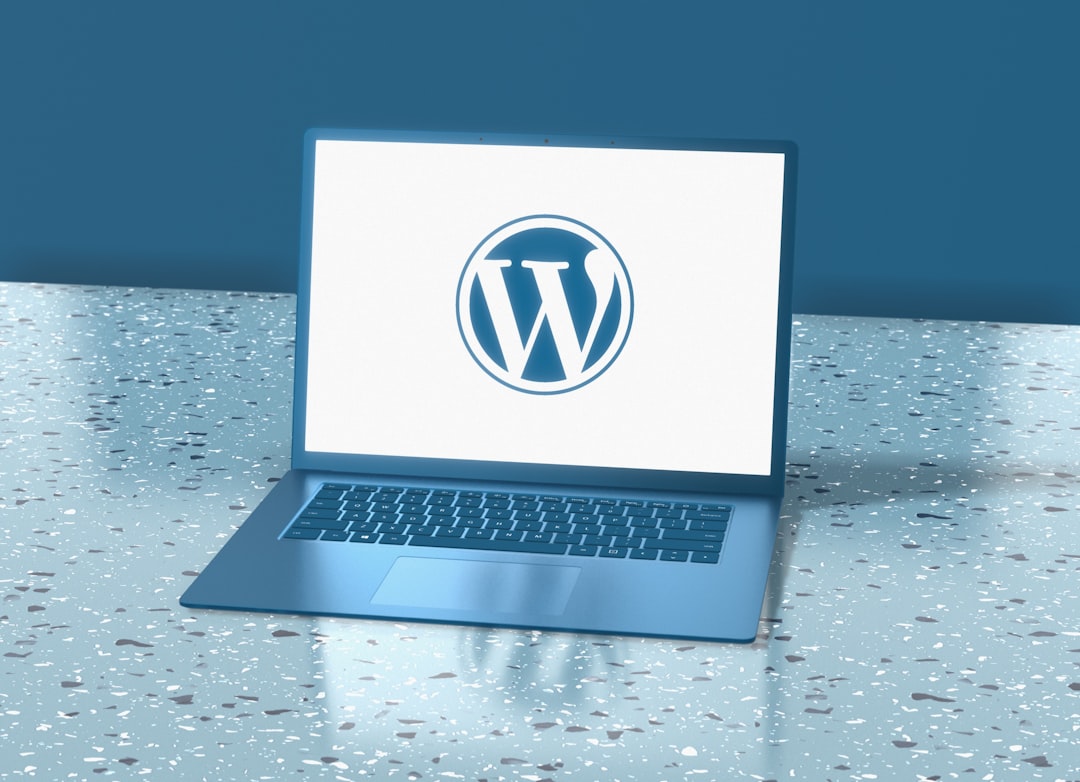 a laptop computer sitting on top of a table wordpress admin wp config settings code editor