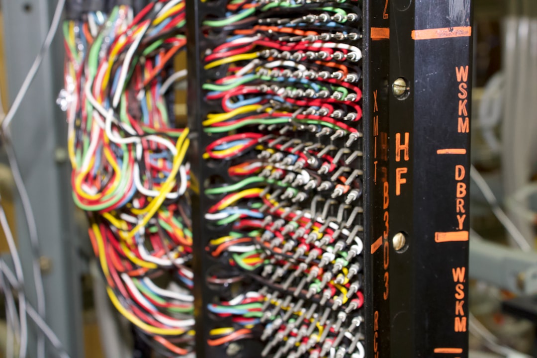 a rack of wires and wires in a room cable labels network cables server room