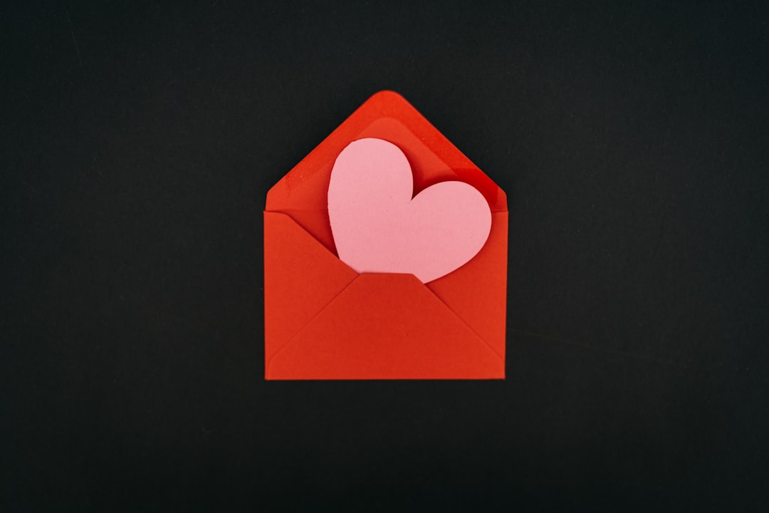 a red envelope with a heart cut out of it puzzle icons email folders gamified