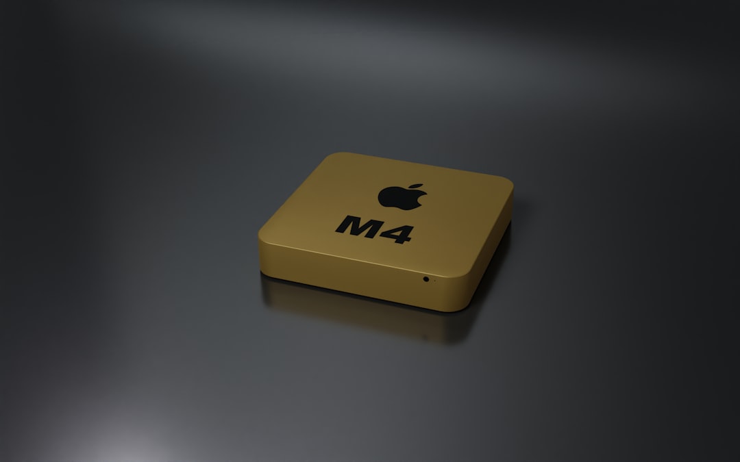 a yellow box with a black m4 logo on it macbook m2 iphone 15 pro apple ecosystem