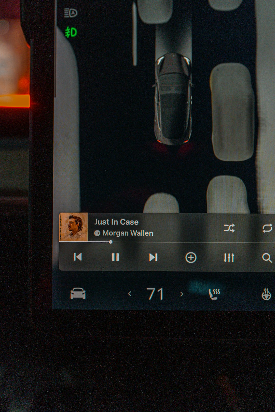 teslas display shows cars surroundings and music youtube music mobile app autoplay toggle autoplay icon