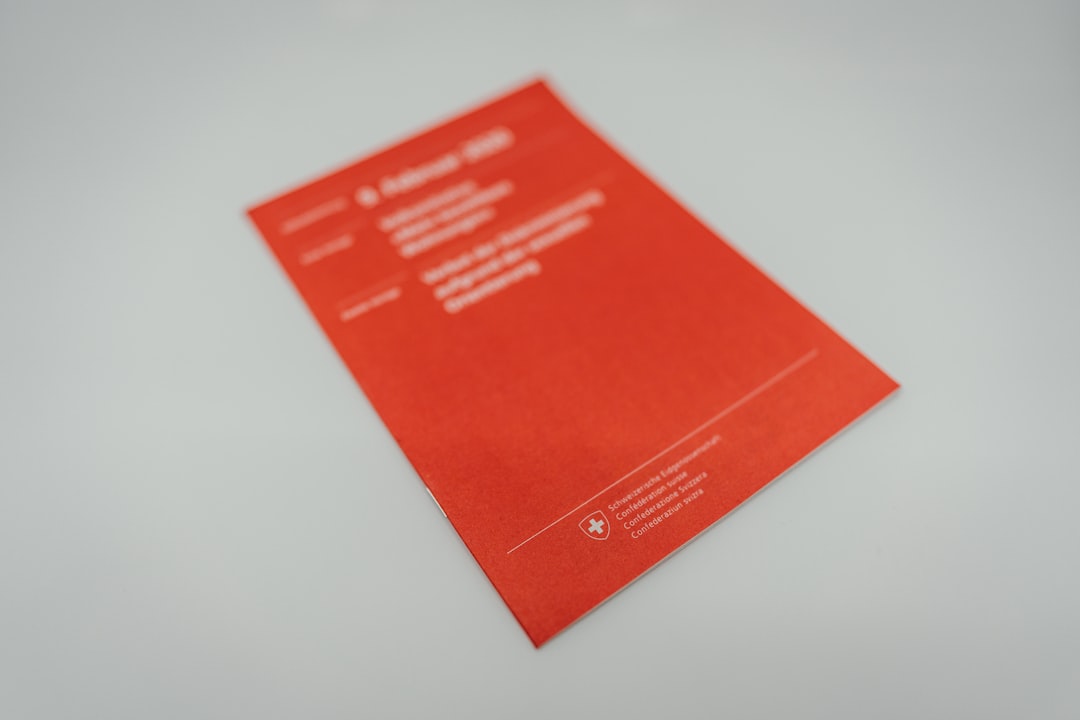 red and white paper on white table business card printing corporate design