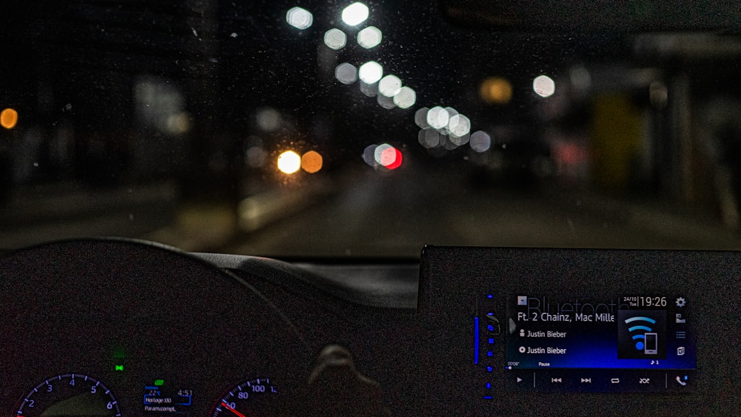the dashboard of a car at night time windows autopilot enrollment windows setup
