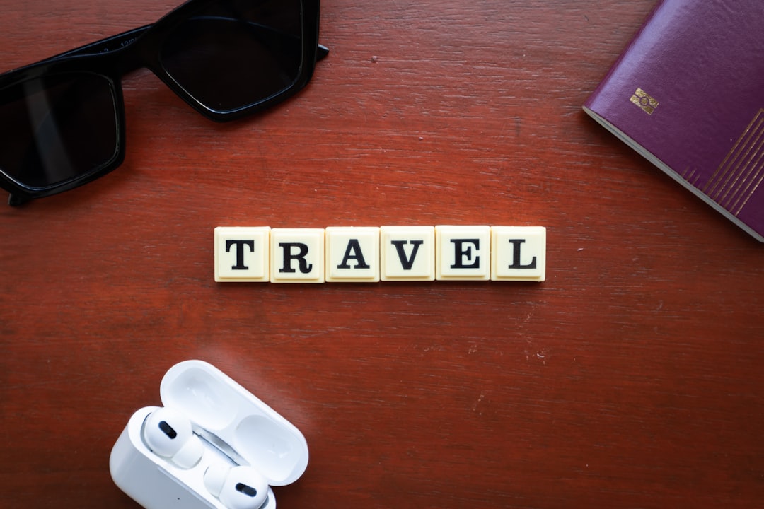 the word travel spelled with scrabbles on a wooden table wordpress plugin dashboard vacation rental booking calendar integration 1