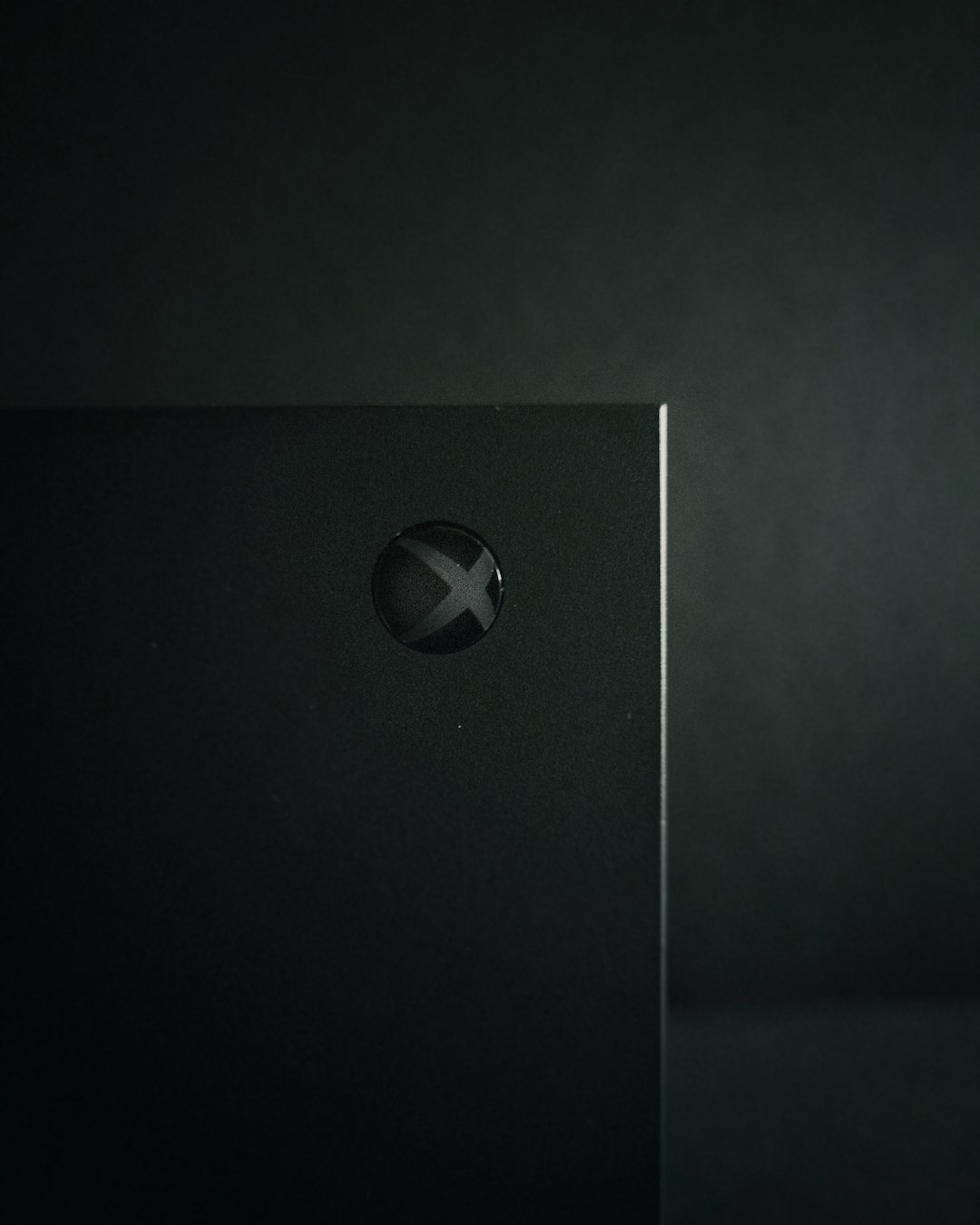a close up of a metal object with a black background xbox privacy settings authentication settings minecraft microsoft