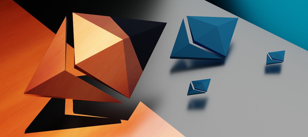 a group of blue and orange shapes on a white surface canary mail app inbox secure email multiple accounts dark mode