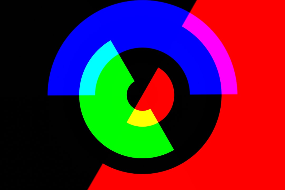 a multicolored circle with a black background geometric bar logo colorful pattern modern lounge