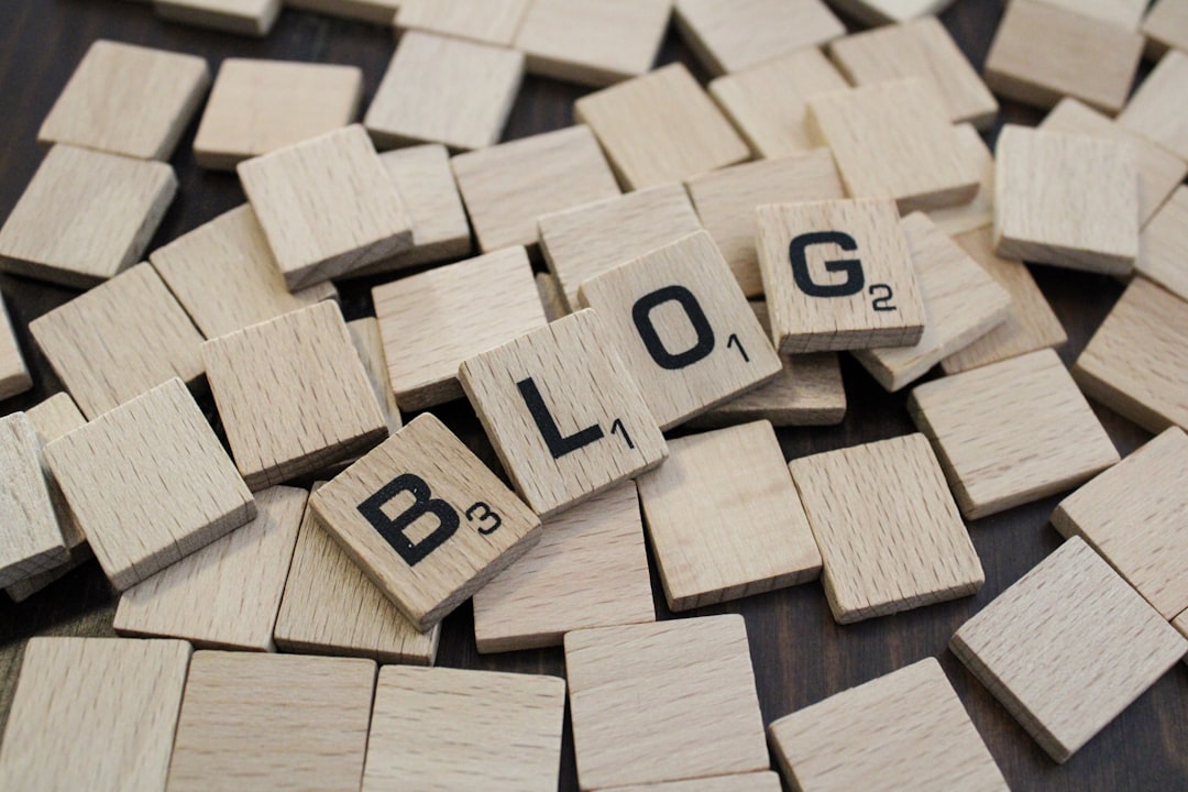 a pile of wooden blocks with the word blog spelled on them blog post update seo analytics content refresh