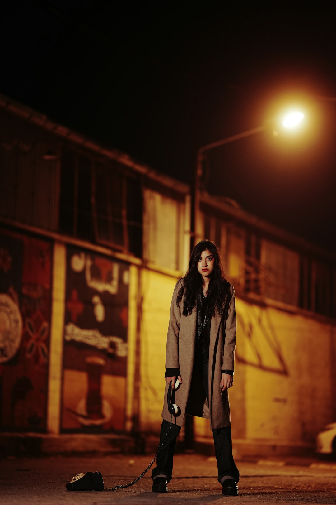 a woman standing in the middle of a street at night lee seo hwan acting dramatic scene emotional