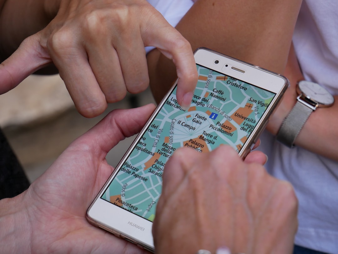 person touching smartphone interactive map traveler with checklist real time weather app