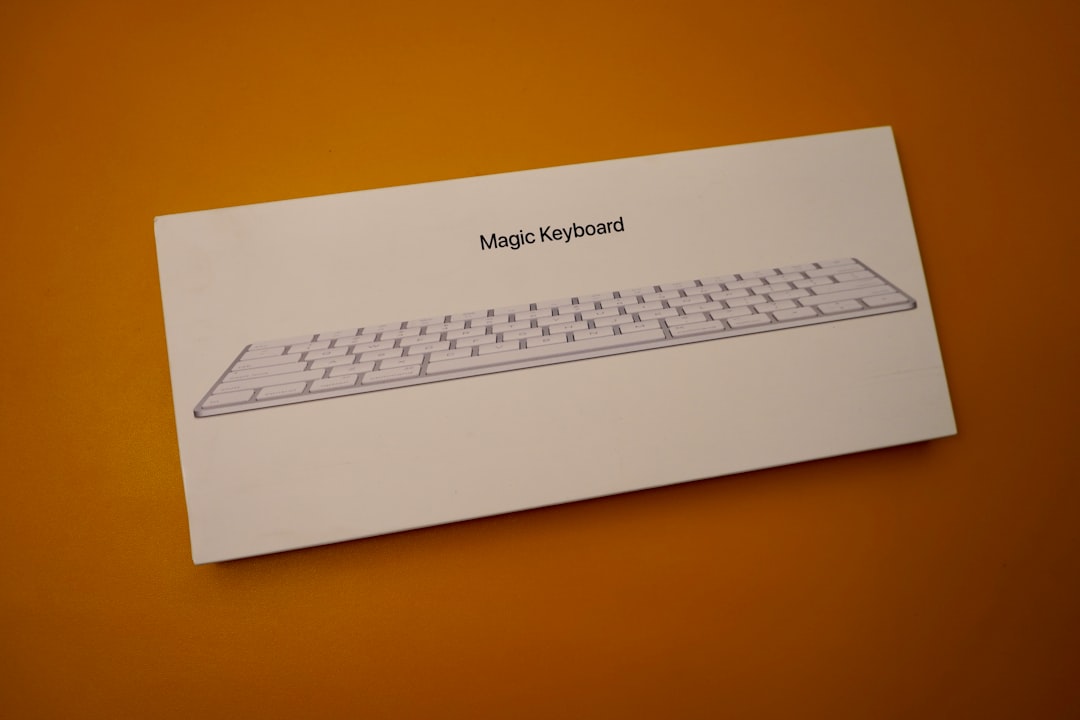 white keyboard on orange surface keyboard maestro hammerspoon apple script terminal