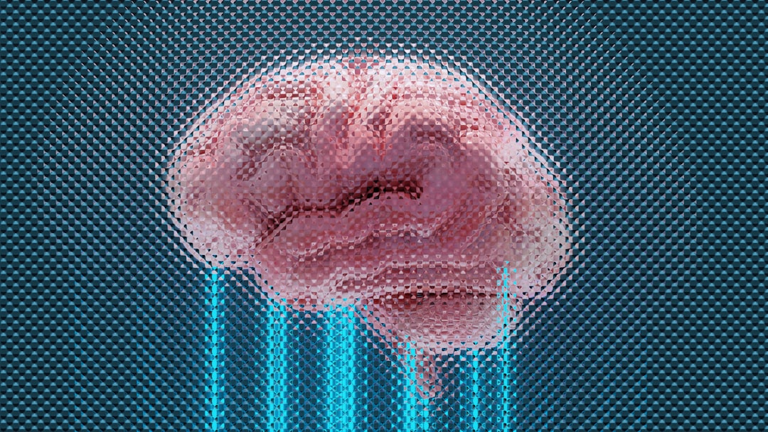a brain displayed with glowing blue lines brain computer interface thought decoding emotions
