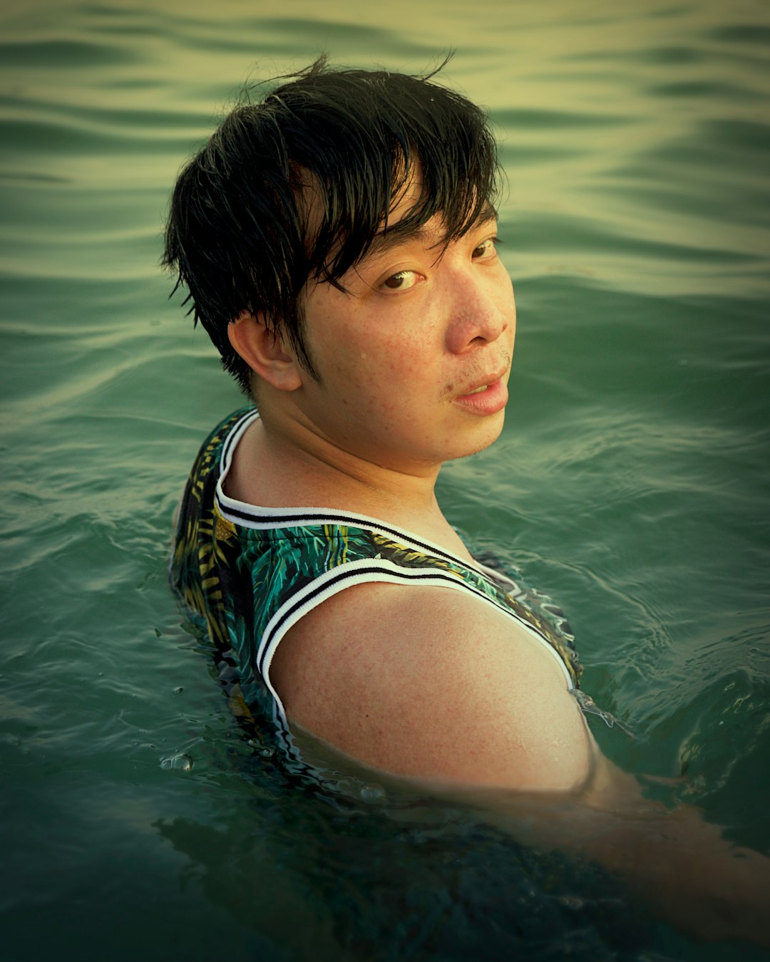 a person in a swimsuit in the water search photo face ai