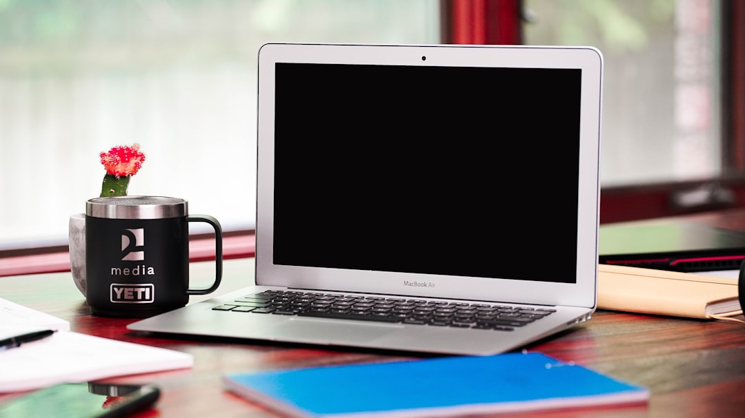 a laptop computer sitting on top of a wooden desk remote work video tutorial recording online presentation screen capture business laptop workspace 1