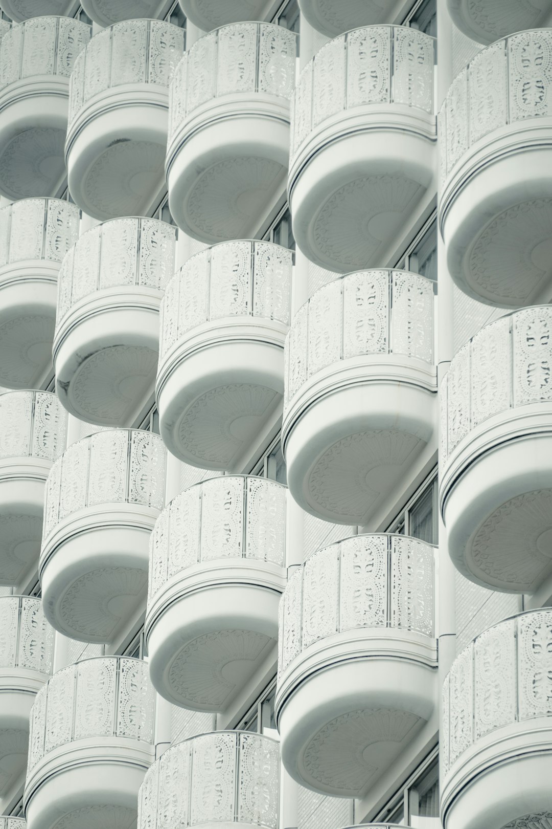 a large group of white round objects on a wall cloud storage buckets file manager interface