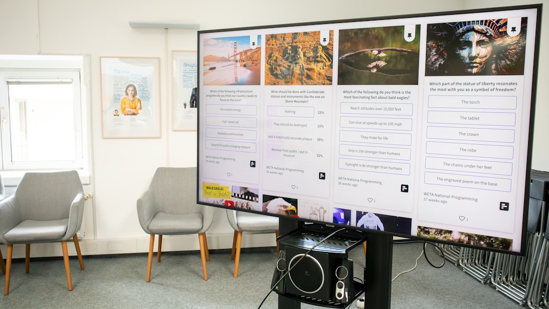 a large screen in a room with chairs marketing concept art product showcase background social media graphic design digital advertising visual