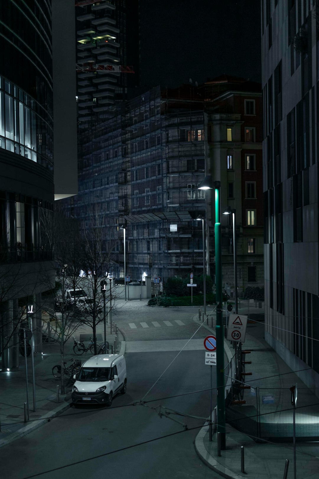 cars on road in between high rise buildings during daytime creative storyboard frames cinematic lighting futuristic city scene concept art panels