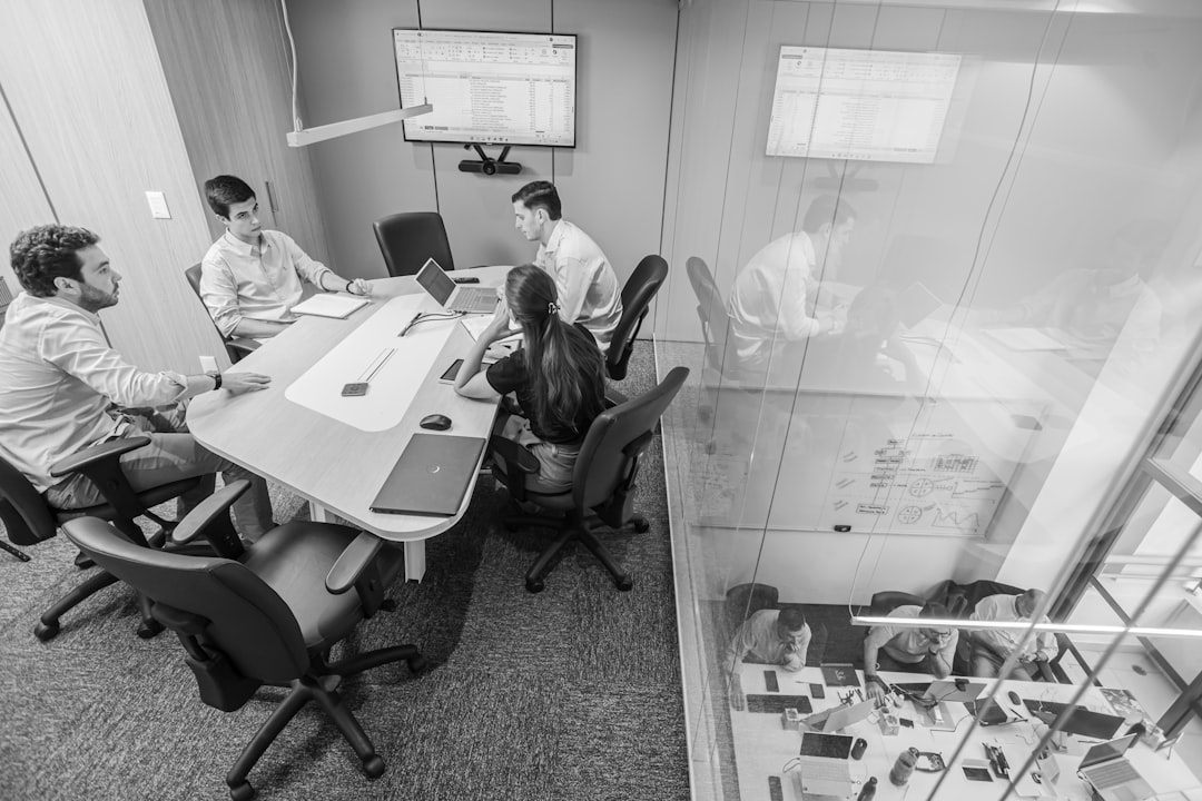 team meeting in a modern conference room team workshop strategy planning boardroom collaboration charts