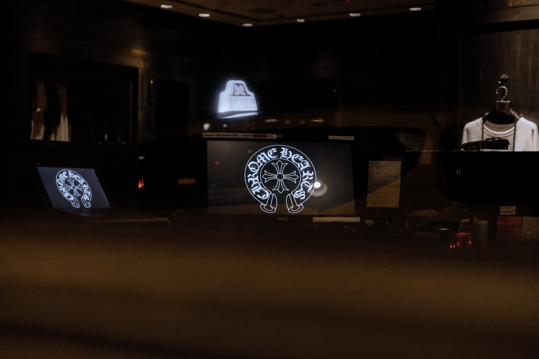 white and black round wheel digital mystery glowing symbols dark background