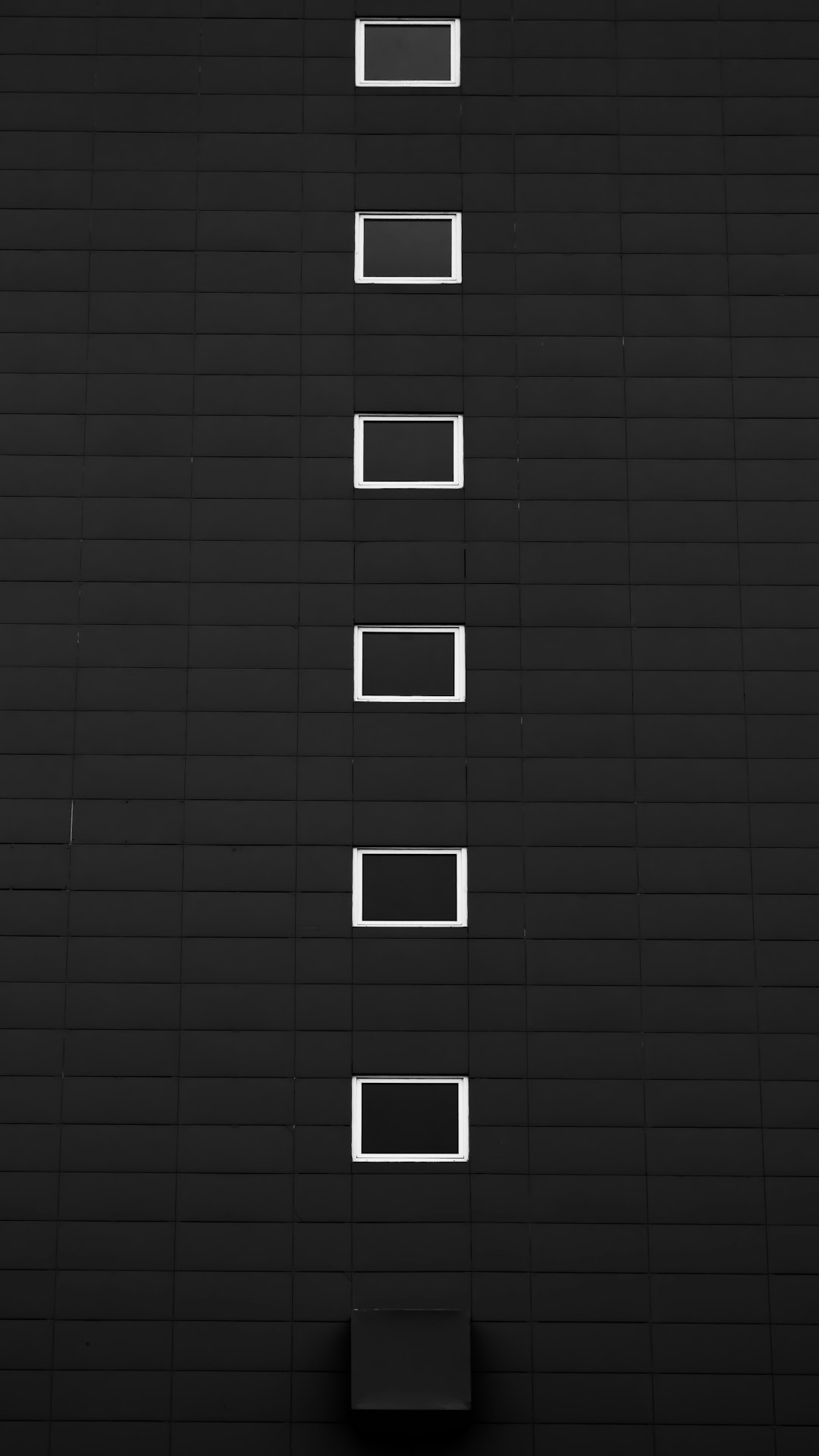 a black and white photo of a wall with squares wordpress block editor image advanced settings panel